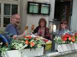 Jim, Mick, and Caroline toasting our good fortune