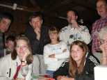 Everyone pays rapt attention to Caroline's slide show