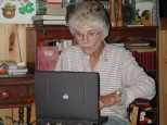 Sarah looks for email, regularly