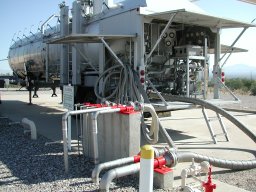 Rocket fuel tanker and silo hookup