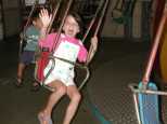 Emma takes to the swing