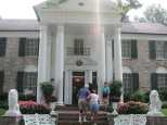 Caroline at the steps to the mansion