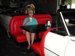 A drink in a Cadillac