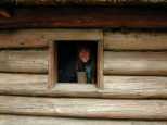 Caroline peers out of Lewis & Clark's room