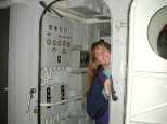 Caroline on the bridge of the USS Knapp