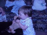 Adriana tasting the dog